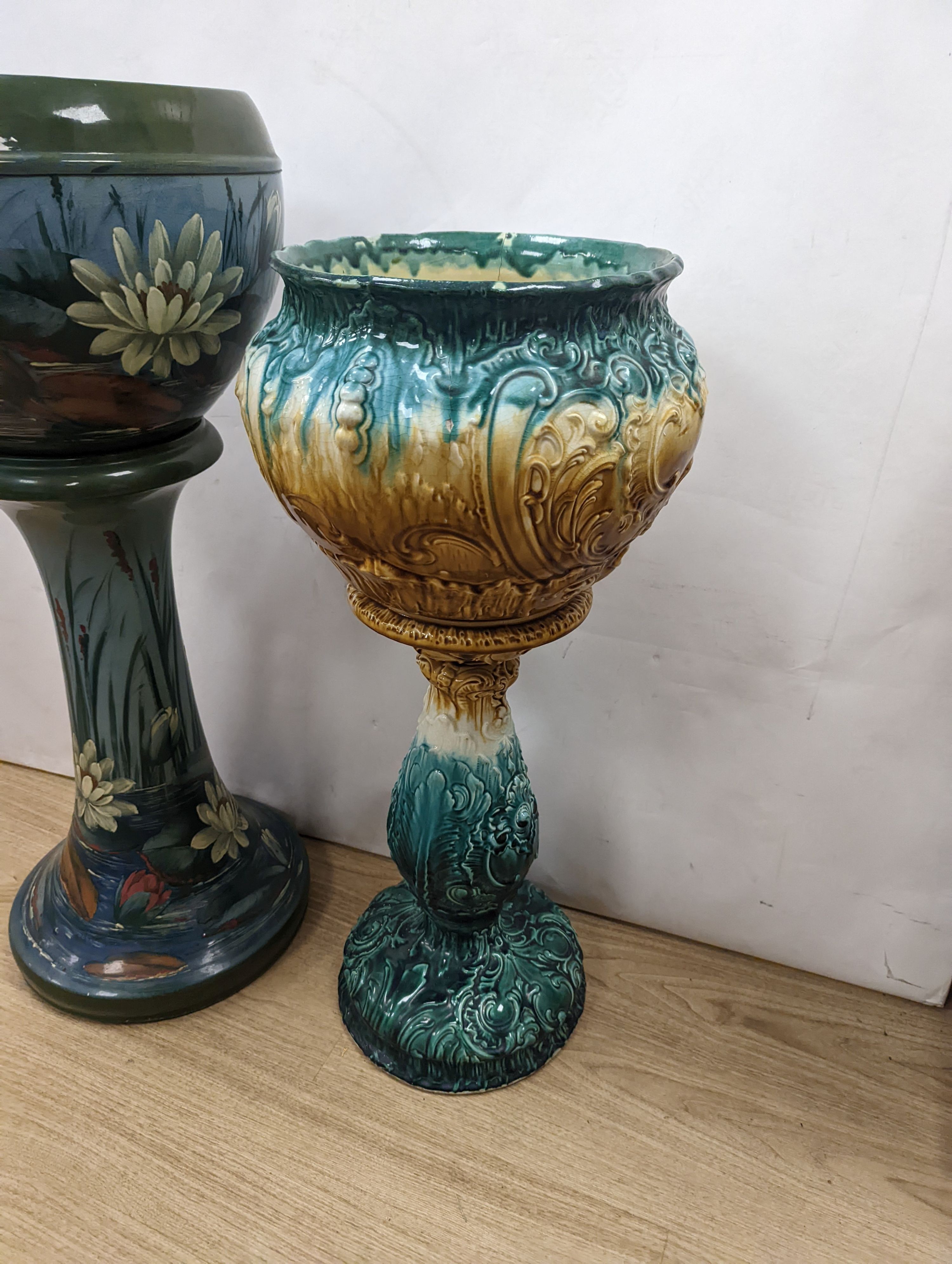 A Staffordshire pottery jardiniere and stand (the jardiniere with a small crack) and another, tallest 90cm